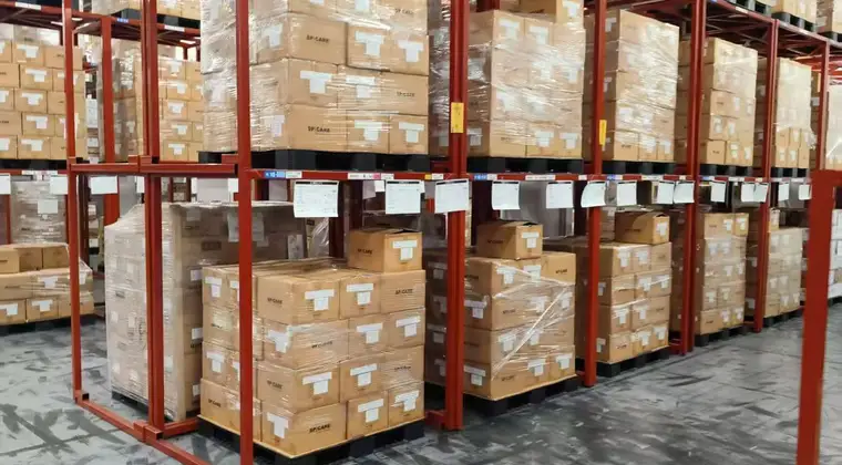 Palletized cartons stored in a consolidation warehouse